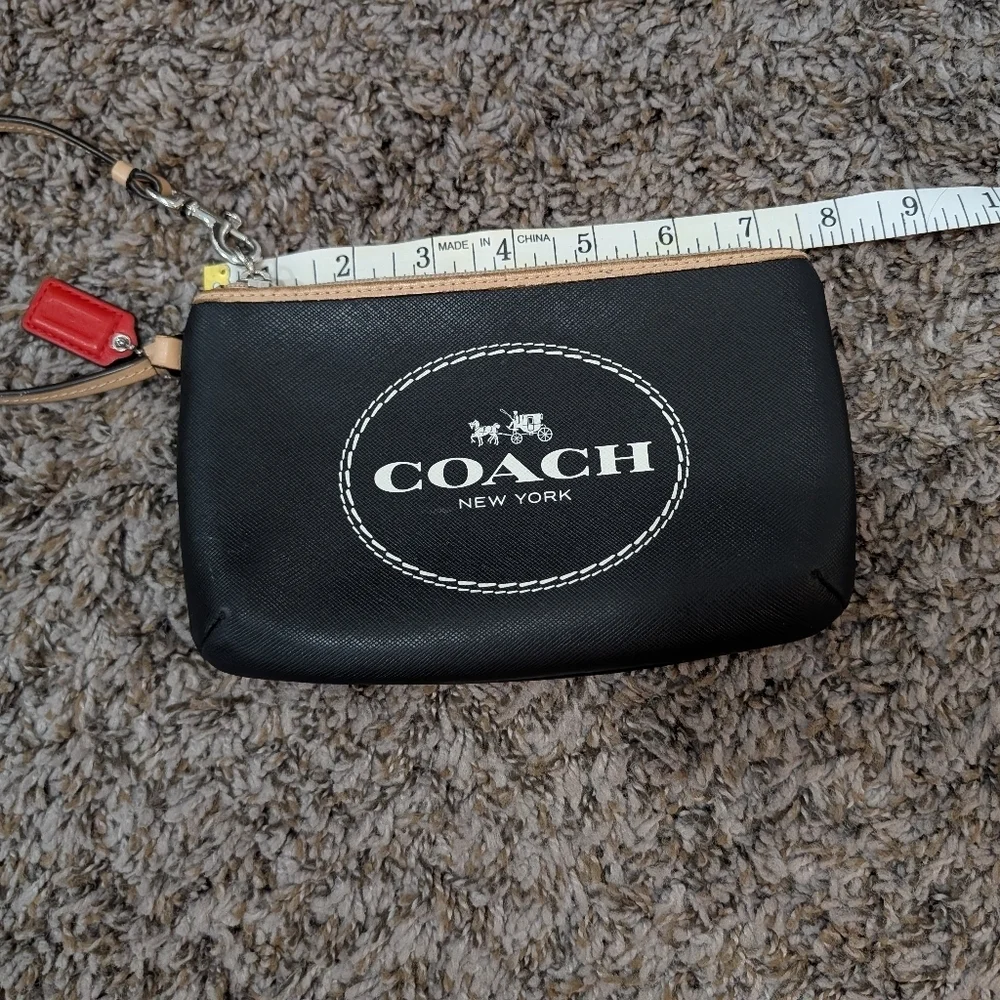 Coach Black and Tan Wristlet with Red Tag